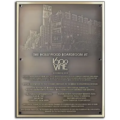 Building dedication plaque with architectural rendering
