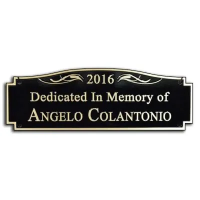 Small bronze memorial plaque for a garden