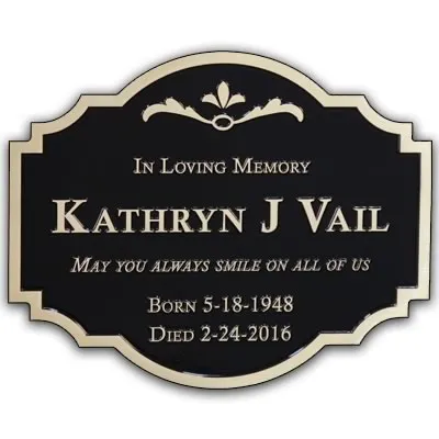 In loving memory bronze plaque with portrait photos