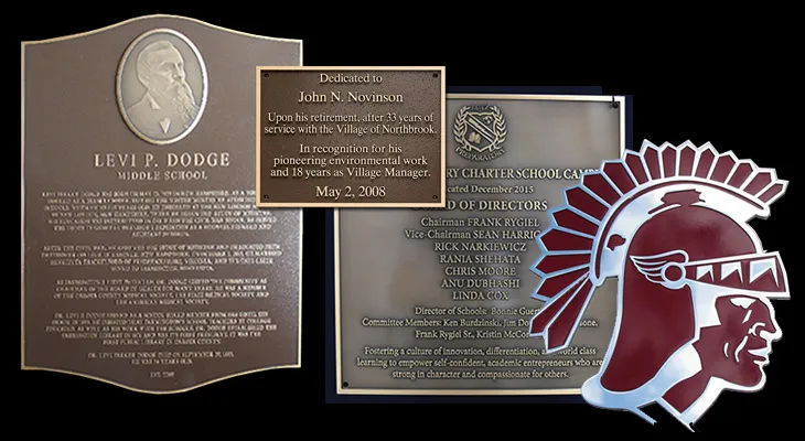 Bronze school dedication plaque featuring the school logo and contributing members