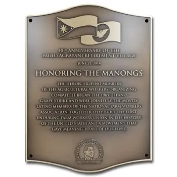 Curved-shape bronze plaque with raised graphic and logo