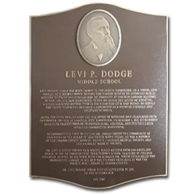 Curved aluminum plaque with framed portrait on black leather texture