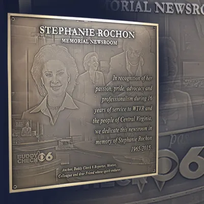 Bronze memorial plaque with engraved photo collage artwork