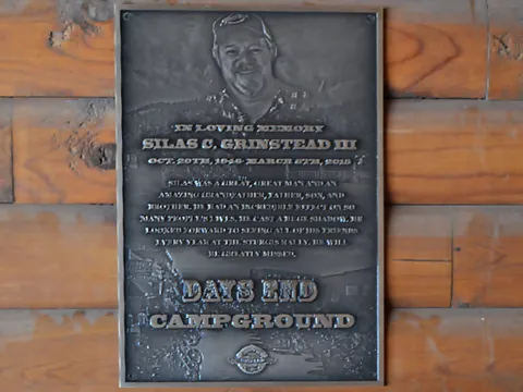 Camp dedication plaque