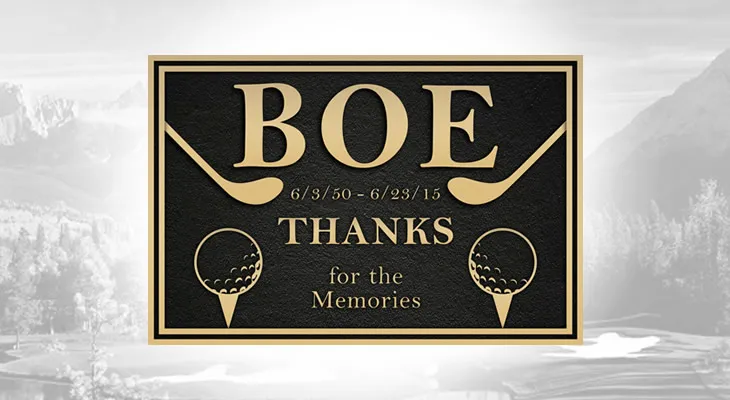 Bronze golf memorial plaque honoring a golfer